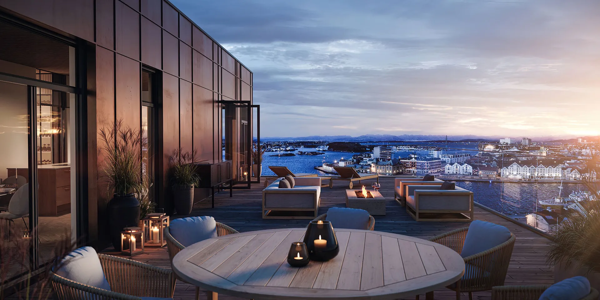 Bykronen: takterrassen i skumringen over Stavanger havn.